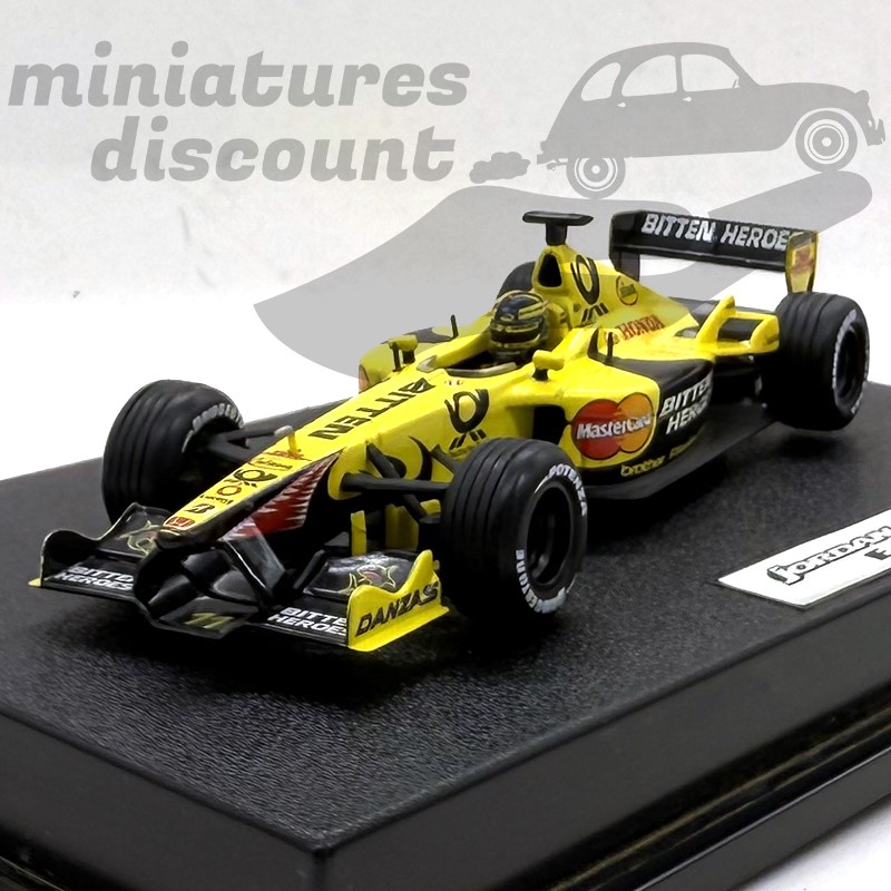 JORDAN EJ11 PILOTÉE PAR HEINZ HARALD (JAUNE) - HOTWEELS - 1/43ème en boite