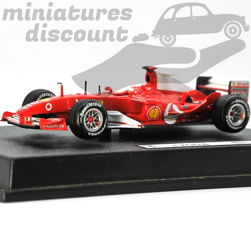 FERRARI F2004 HOT-WHEELS CONDUITE PAR MICHAEL SCHUMACHER (ROUGE) - HOT WHEELS - 1/43ème en boite